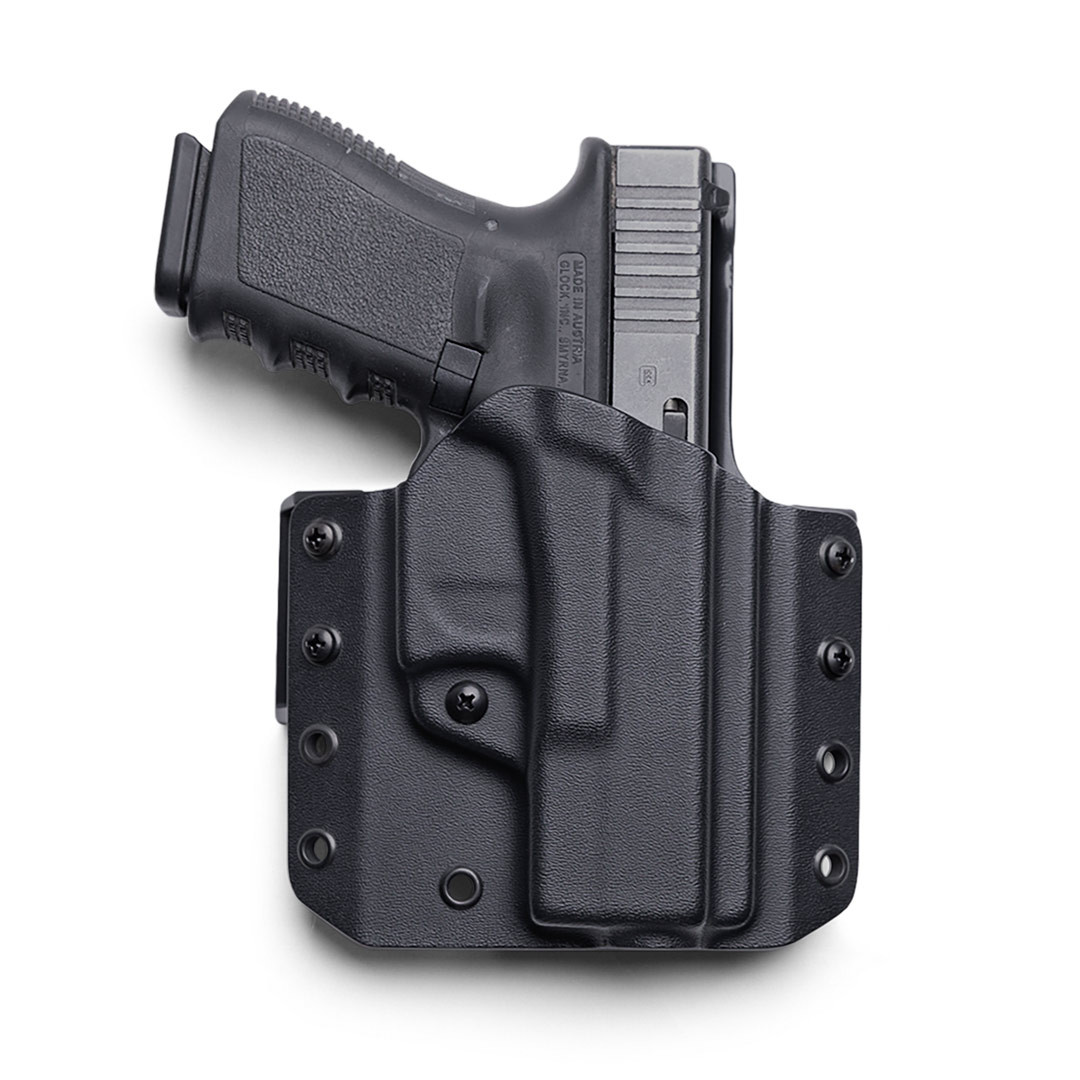 Front view of LightDraw with standard belt clips and holstered firearm featuring no/zero cant angle.