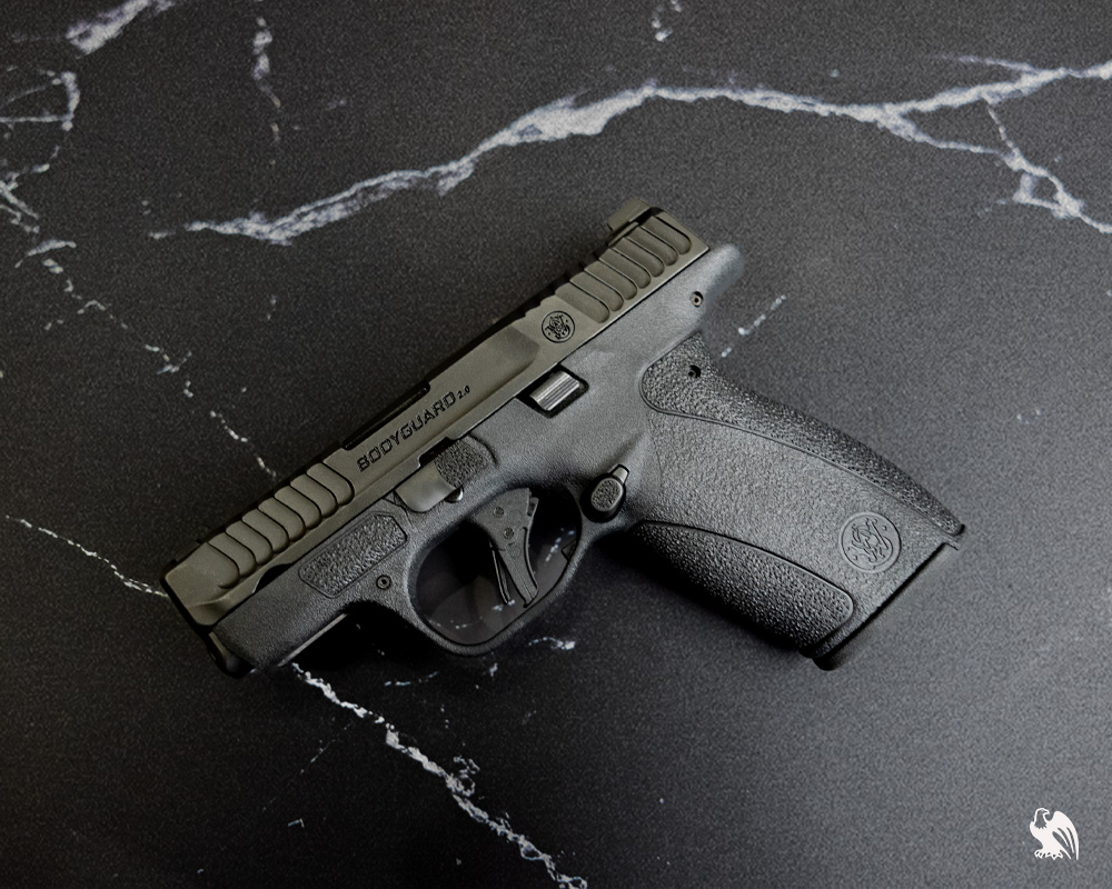 The Smith & Wesson Bodyguard 2.0 handgun laying on a table