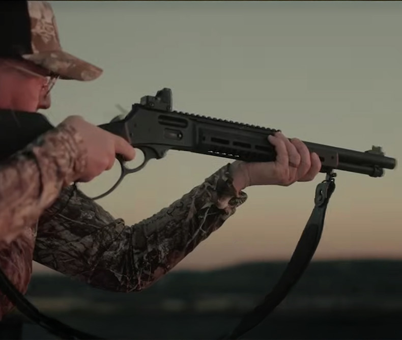 Man aiming down sight on a Smith & Wesson Model 1854 Stealth Hunter Series