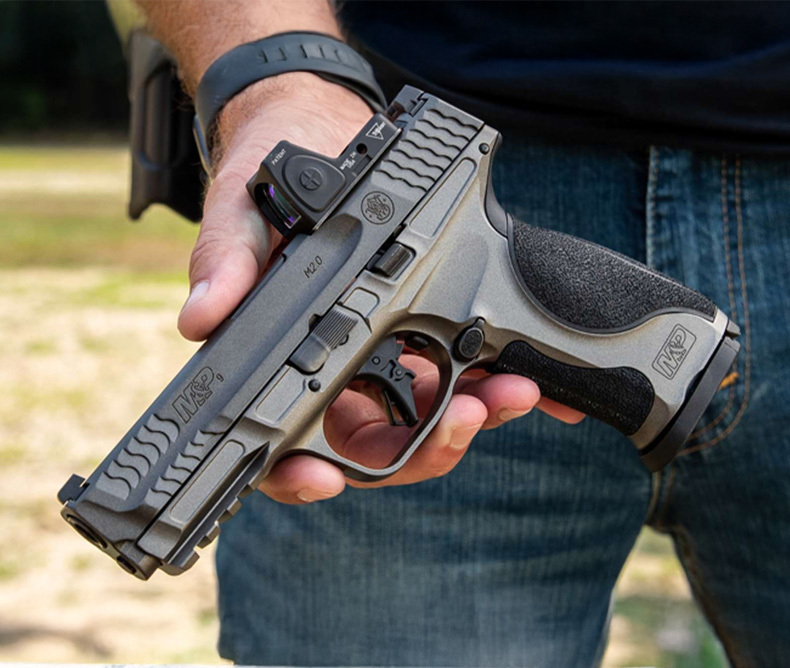 Man holding the new Smith & Wesson Metal Compact Series.