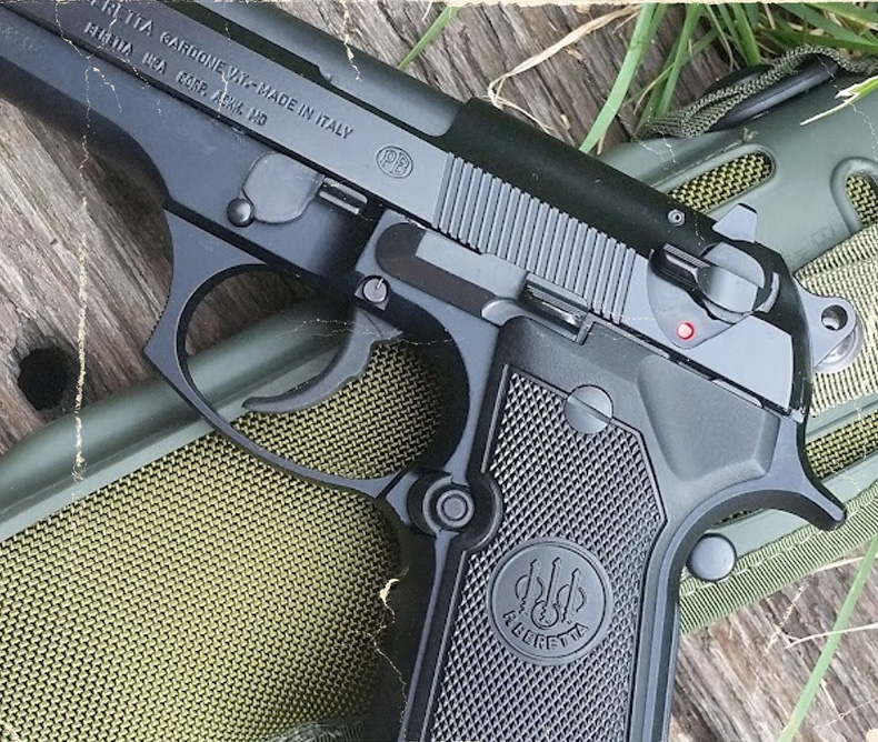 Beretta M9 close up of the safety and trigger