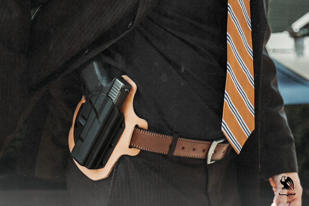 Man wearing a OWB concealed carry Quick Draw from Vedder Holsters