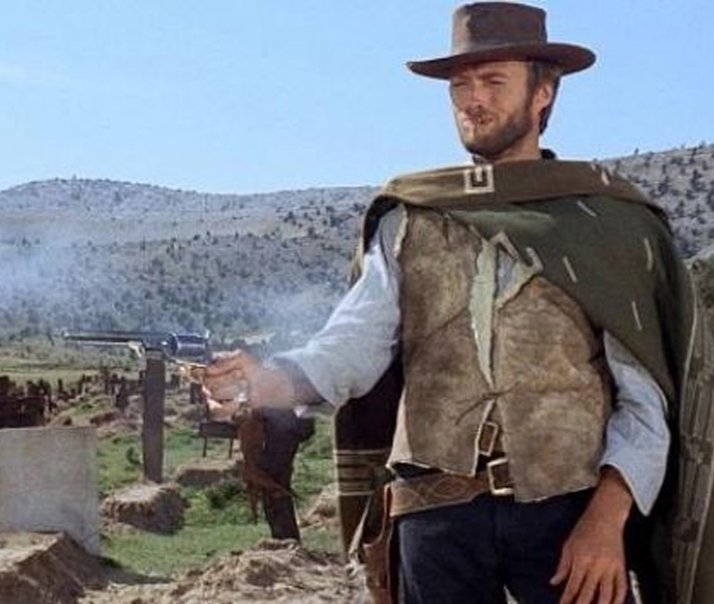 Clint Eastwood firing a Colt 1851 on the movie The Good, the Bad, and the Ugly (1966)