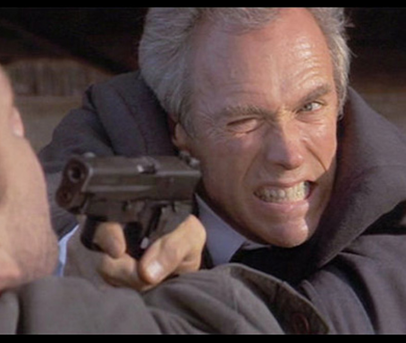 Clint Eastwood firing a Sig Sauer P228 on the movie In the Line of Fire (1993)