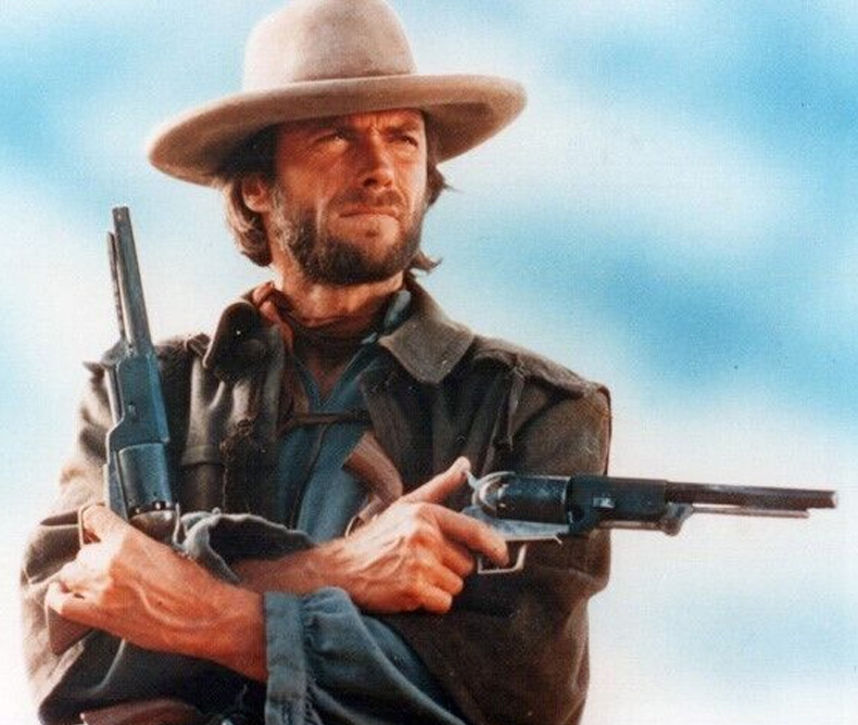 Clint Eastwood firing a Walker Colt 1847 on the movie The Outlaw Josey Wales (1976)